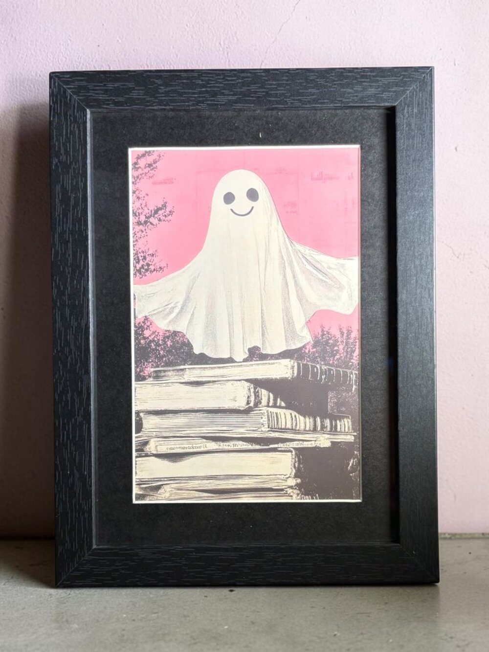 Smiling Ghost & Books Framed Art Print | 5x7